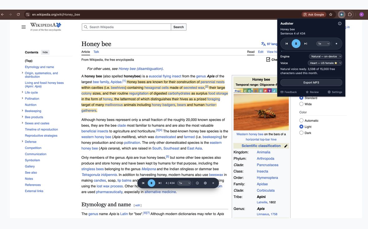 A Wikipedia article being read aloud by Audister: the current sentence is highlighted in the page while the extension popup shows the Natural on-device engine and the Heart voice selected.